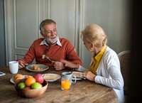 Elderly couple having breakfast