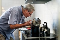 Senior Man Cooking Food Kitchen