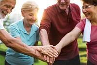 Diverse elderly hands out together teamwork