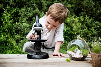 Little Kid Experimenting Science Microscope