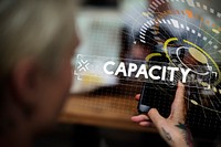 Capacity word graphic design with woman using mobile photo