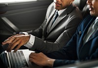 Business Men Use Laptop Car