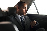 Businessman traveling alone by car
