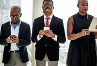 Diverse Business People Use Digital Devices