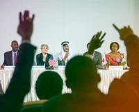 Gradient photo of people in a nations conference