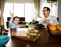 Family Eating Breakfast Together Morning