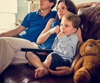 Family Holiday Watching TV at Home Lifestyle