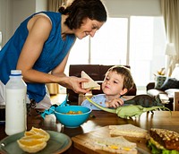 Family Eating Breakfast Together Morning