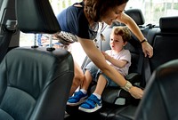 Boy into the Car Using Carseat Protect Security