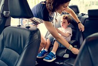 Boy into the Car Using Carseat Protect Security