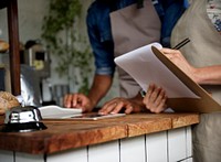 Closeup of hands holding stock checking list paper