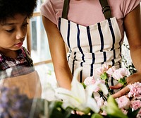 Closeup of kid in flower shop