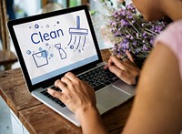 Illustration of home cleaning service on laptop