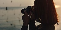 Girl using her camera outdoors