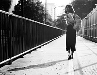 Girl looking back while walking