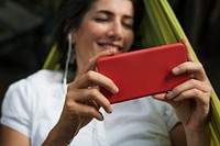 Adult Woman Using Mobile Phone on Hammock