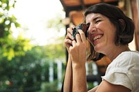 Woman traveler photographer holiday lifestyle trip