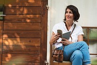 Woman holiday lifestyle wrting dairy relax at cafe