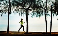 Woman jogging on a beach