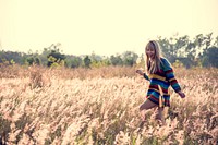 Young girl enjoying the meadows
