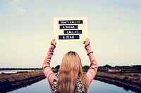 Young Woman Hands Holding Blank Paper with Life Motivation Phras