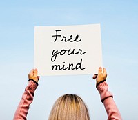 Free your mind placard on sky background