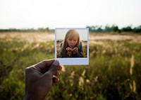 Woman with frame portrait with nature