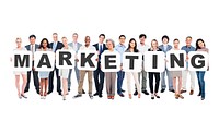 Multi-Ethnic Group Of Diverse People Holding Letters That Form Marketing
