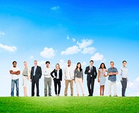 Group Of Business People Outdoors Smiling And Standing Confidently