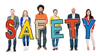 Diverse Group of People Holding Text Safety