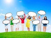 Group of Diverse Multi-Ethnic People Outdoors Holding Empty Speech Bubbles