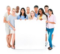 Diverse group holding a white board