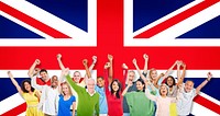Multi-Ethnic Group Of People Raising Their Arms And Expressing Positivity With British Flag As A Background