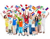 Large group of multi-ethnic diverse mixed age people celebrating while holding flags.