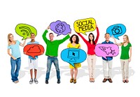 People Holding Colorful Speech Bubbles with Social Media Symbols