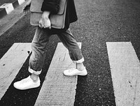 Person walking across the pedestrian lane