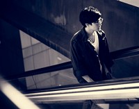 Young asian using escalator routine life