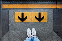 Aerial view of arrow guides on train platform