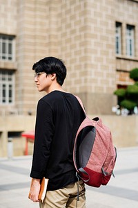 Young asian guy with a backpack