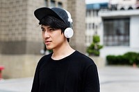 Guy listening to music with headset on