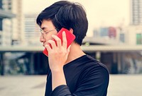 Asian man talking on mobile phone communication