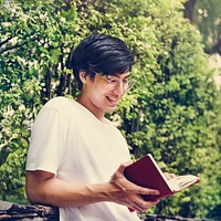 Asian man reading book relaxation