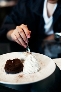 Chocolate lava cake with ice cream and whip cream sweet dessert