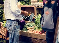 People Buying Fresh Local Vegetable From Farm at Market