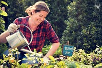 Woman farmer gardening at countryside