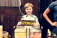Little Boy Selling Lemonade at Fresh Market