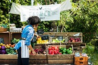 Woman Selling Fresh Local Vegetable at Farmers Market