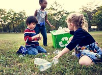 Ecology group of children separate trash for recycle