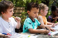 Group of children drawing imagination outdoors