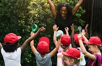 Teacher and kids school learning ecology gardening